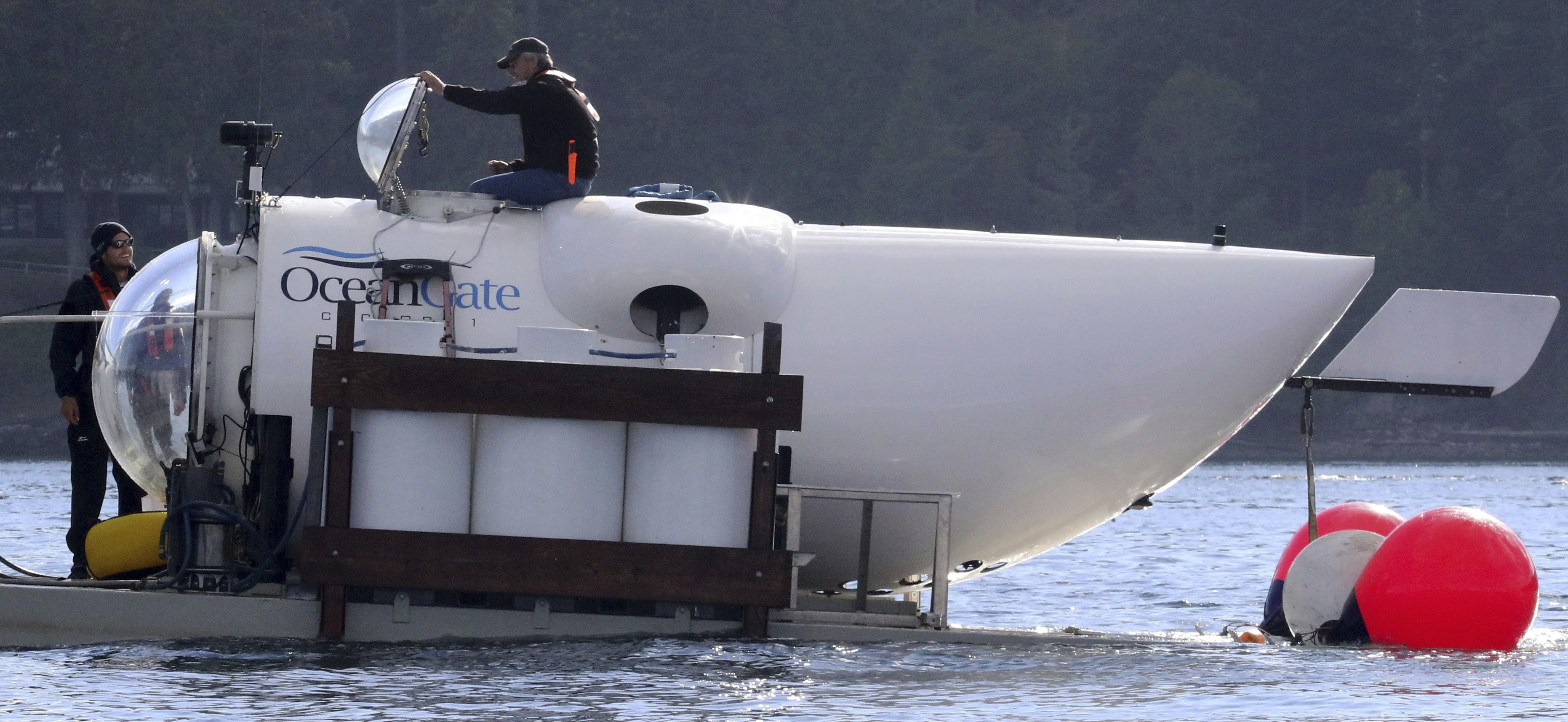 OceanGate CEO Stockton Rush emerges from the hatch atop the OceanGate submarine Cyclops 1 in the San Juan Islands, Wash., on Sept. 12, 2018. 