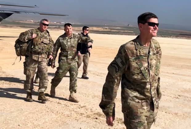 U.S. Army General Jospeh Votel visiting an airbase at an undisclosed location in northeast Syria in February.