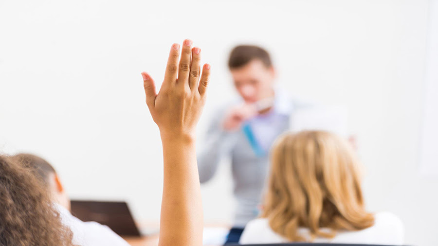 A student with their hand up