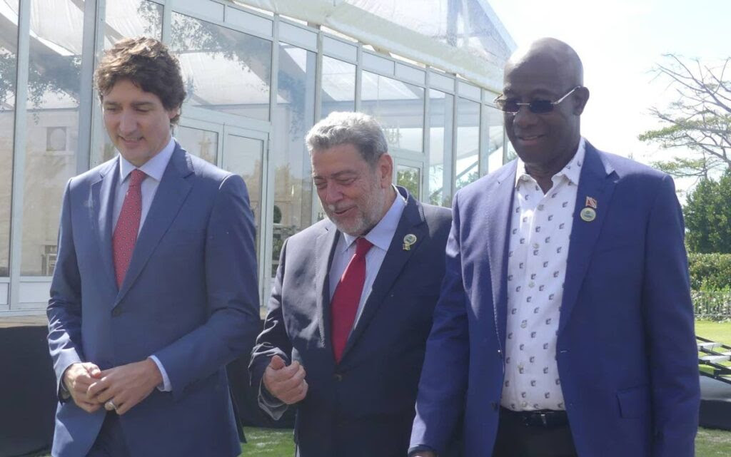 Prime Minister Dr Keith Rowley, right, with Prime Minister of St Vincent and the Grenadines Dr Ralph Gonsalves, centre, and Canada's Prime Minister Justin Trudeau at the 44th Regular Meeting of the Caricom Heads of Government in Bahamas on February 16. - Photo courtesy OPM