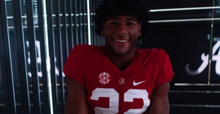 Justice Haynes in an Alabama uniform