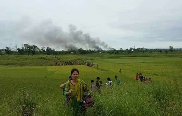 Jumma villagers flee from an attack, Chittagong Hill Tracts, Bangladesh