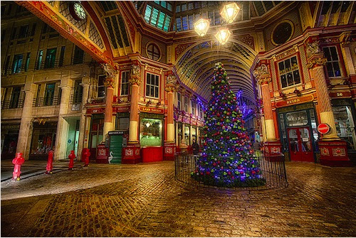 impressive Leadenhall Market in London, which has been around since the 14th century, is decorated with Christmas trees and tinsel to get shoppers in the holiday spirit