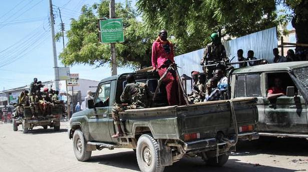  In turmoil: Military personnel supporting the opposition leaders on a street in Mogadishu, Somalia, on Sunday. 