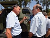 Maj. Gen. Udi Adam (ret.), left, speaks with Israeli Defense Minister Moshe Ya'alon