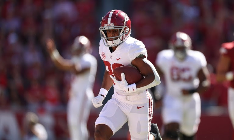 Alabama wide receiver Kobe Prentice (80) runs after the catch against Arkansas at Donald W. Reynolds Razorback Stadium in Fayetteville, AR on Saturday, Oct 1, 2022.