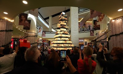 Mall of the Emirates visitors watch as the mall's carbon neutral LED tree showcases an impactful display centred around climate change and sustainability Mall of the Emirates visitors watch as the mall's carbon neutral LED tree showcases an impactful display centred around climate change and sustainability