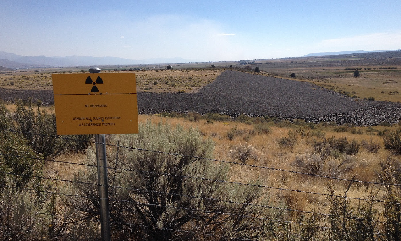 Image of Uranium disposal site in southern Oregon. A no trespassing sign warns of radioactive danger. 