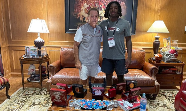 Myles Graham poses with Nick Saban