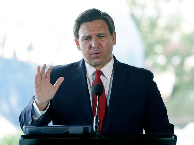 Gov. Ron DeSantis Orders Return of Florida National Guard Troops: ‘They’re Not Nancy Pelosi’s Servants’ Ron-DeSantis-podium-hand-five-ap-640x480