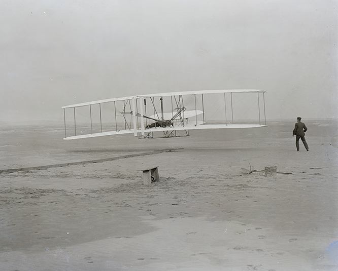 First flight 120 feet in 12 seconds 10-35 a.m. Kitty Hawk North Carolina ..