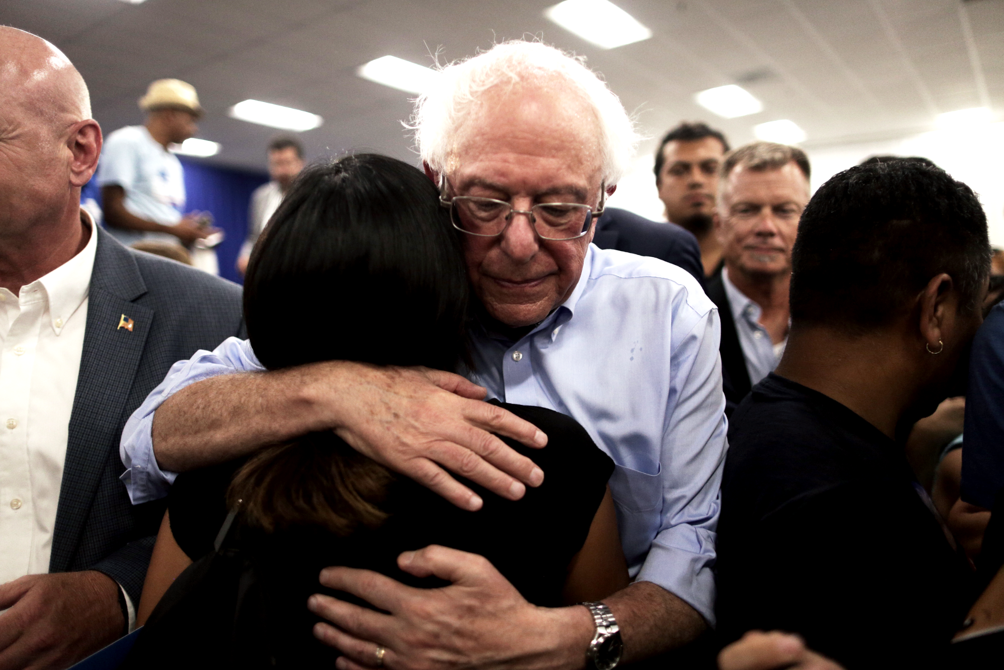 Bernie hugging supporter.