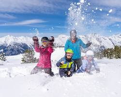 family skiing in Switzerland