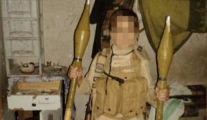 Muslim children pose with weapons and mutilated bodies in Syria, are now back in Sweden