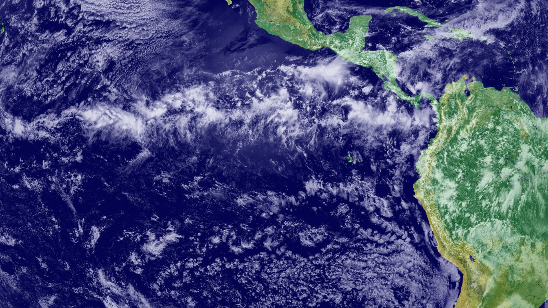 Map showing Mexico, Central America and northern South America. Near the equator, a band of thick white clouds cross the satellite image.