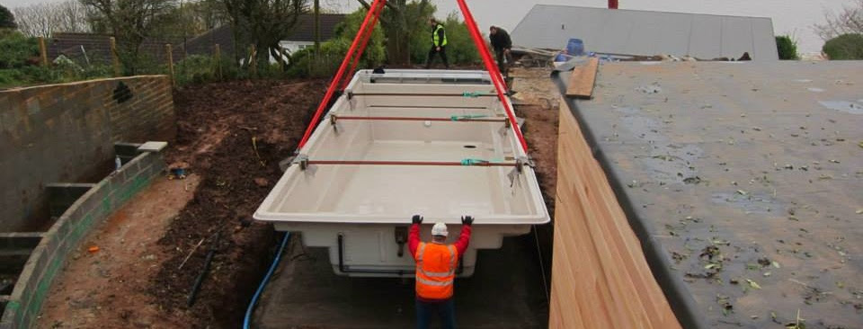Empty Pool Lowered into Ground