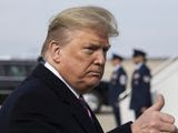 President Donald Trump gives thumbs up after speaking with the media as he boards Air Force One as he departs Tuesday, Feb. 18, 2020, at Andrews Air Force Base, Md.(AP Photo/Alex Brandon)