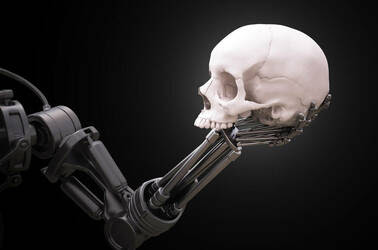 A robot hand holding a skull