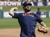 Houston Astros&#39; Jose Altuve warms up before a spring training baseball game against the Detroit Tigers Monday, Feb. 24, 2020, in Lakeland, Fla. (AP Photo/Frank Franklin II) **FILE**