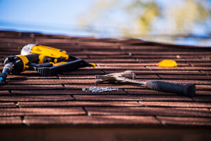 Close-up of roof repair tools