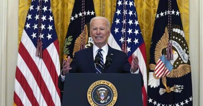 Joe Biden speaking at a press conference Joe Biden speaking at a press conference