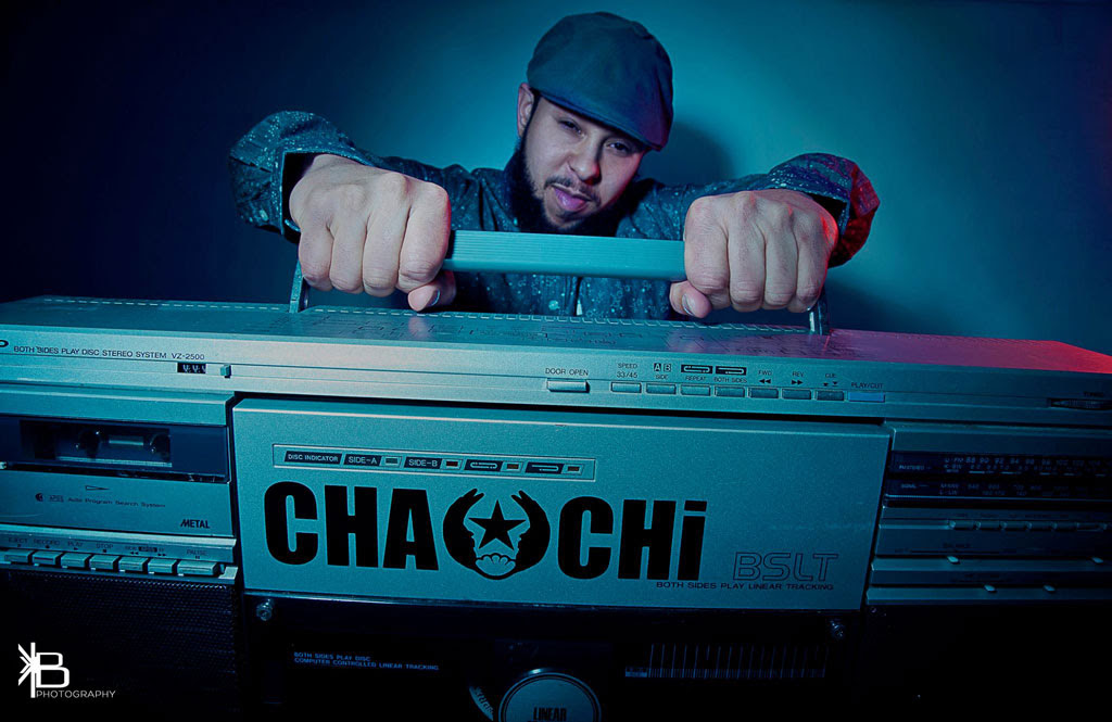 Chachi Carvalho holding a boom box