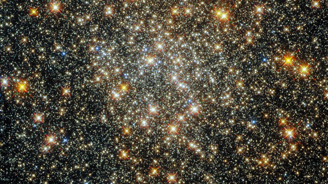 Hubble looks deep into
	</div>
	<br class=