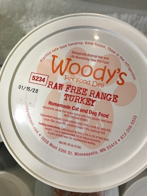 Woody's Raw Free Range Turkey Pet Food container label sell by 01/15/20
