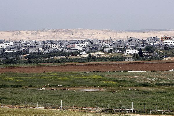 Gaza City seen in the background near the border between Israel and Gaza.