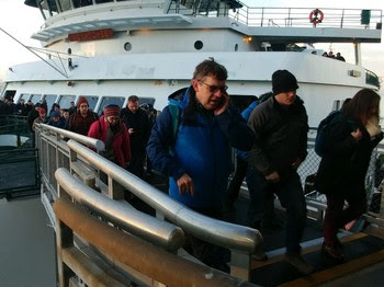 Photo of riders disembarking a ferry