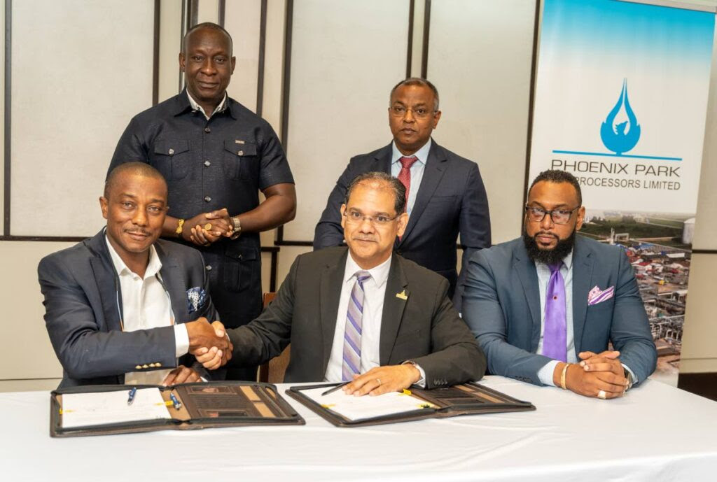 Dr Hilton John Mitchell representative of the Gas Gathering Ltd (front left); Dominic Rampersad, president PPGPL; Dr Joseph Khan chairman PPGPL.Alex Asiamah (back left) and Alvin Dookie VP business and market development PPGPL. (Photo courtesy PPGPL) -