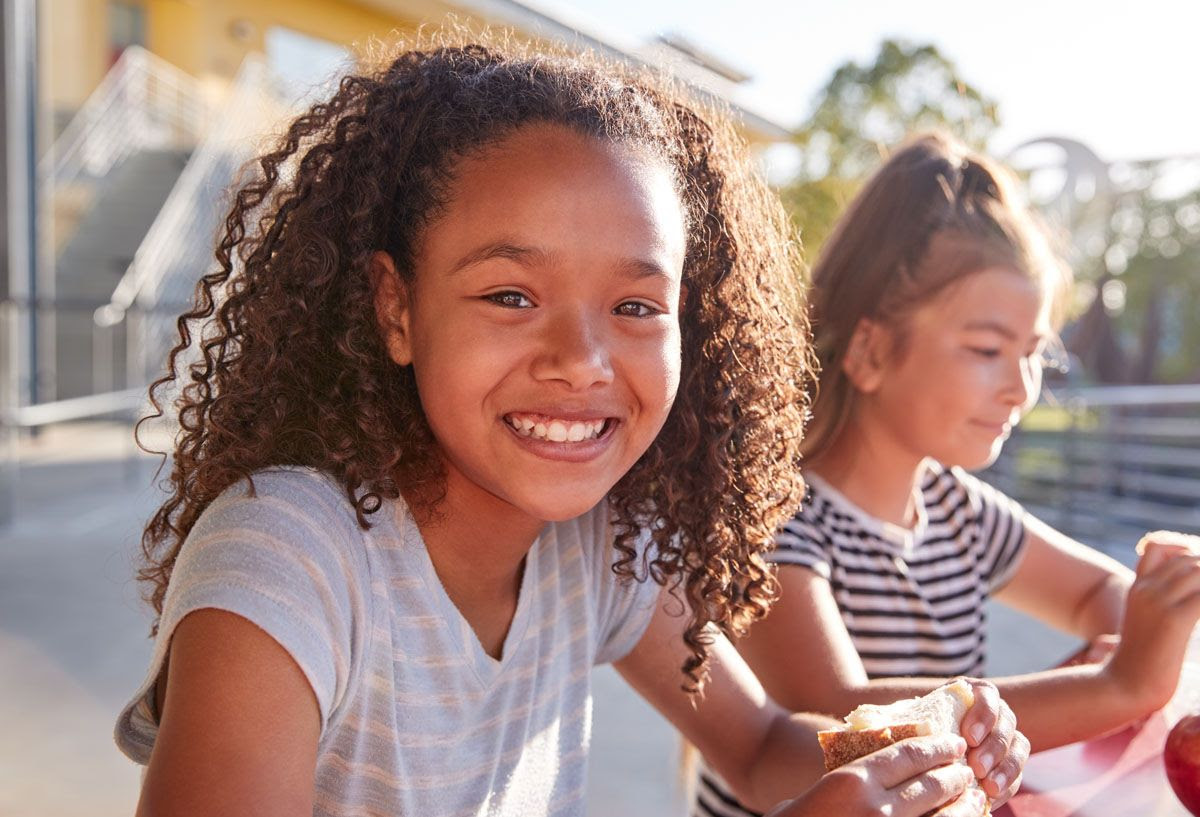 children eating outside