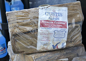 bundle of firewood with USDA certification stamp