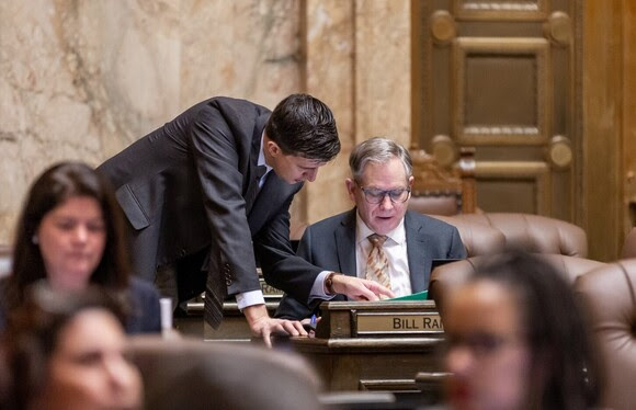 Rep. Ramel working with Rep. Ramos on the House Floor