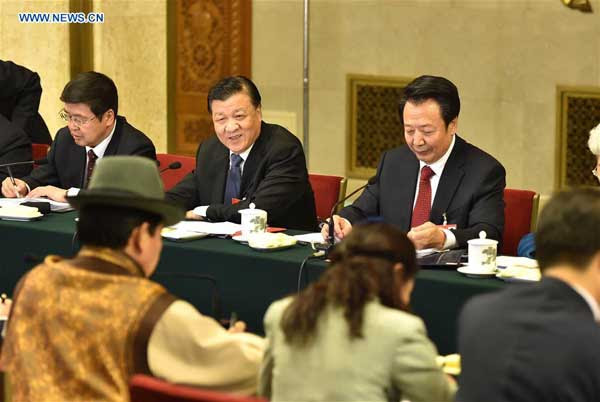 BEIJING, March 5, 2016 (Xinhua) -- Liu Yunshan (2nd L, back), a member of the Standing Committee of the Political Bureau of the Communist Party of China Central Committee, joins a group deliberation of deputies from Inner Mongolia Autonomous Region to the annual session of the National People