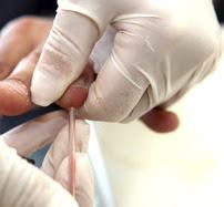 Clinician taking blood test