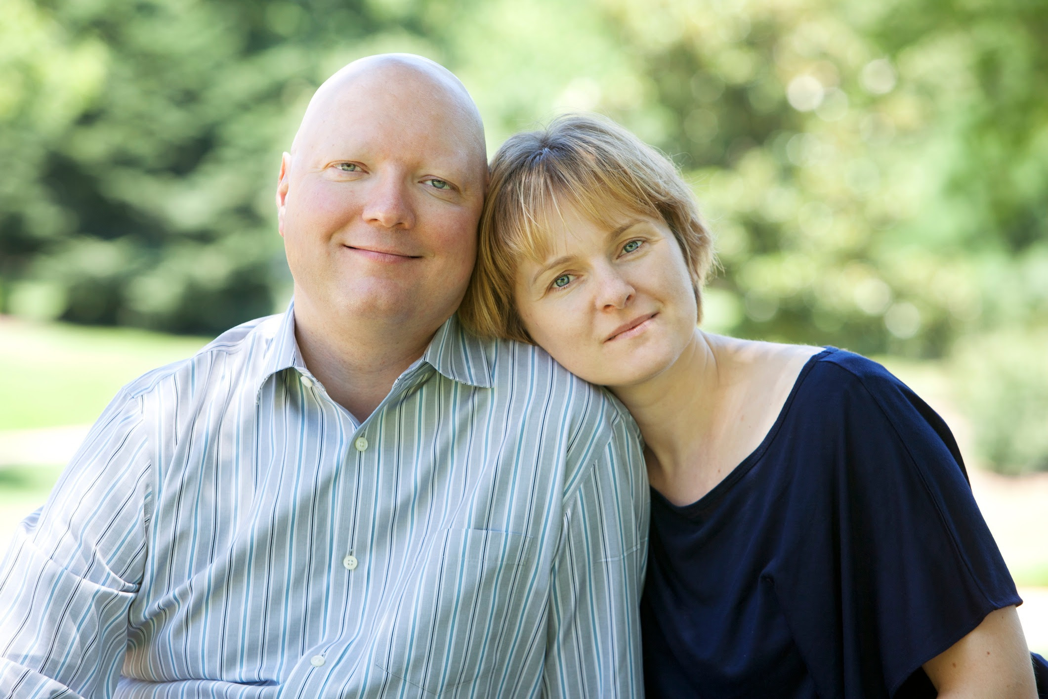 man with cancer being supported by his wife