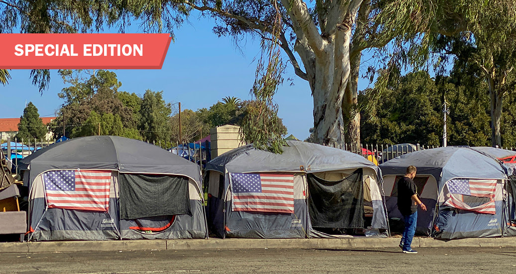 An encampment of tents with American flags in Los Angeles, photo by Bethany/Adobe Stock