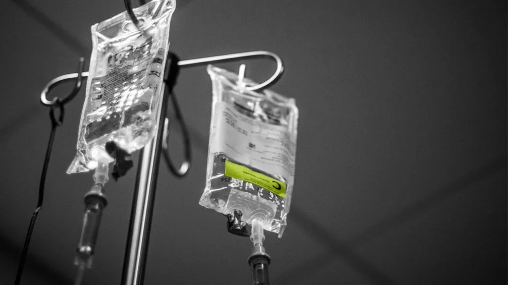 black and white photo of drip bag for cancer treatment