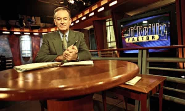 Presenter O’Reilly sits at a desk in TV studio