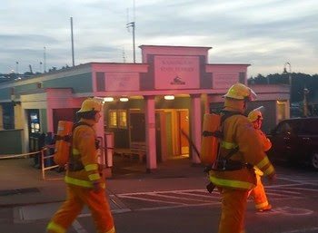 Photo of people in firefighting gear in front Friday Harbor terminal