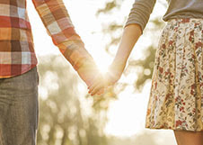 a couple holding hands