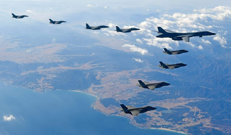 A US Air Force B-1B Lancer bomber flying over South Korea with US and South Korean fighter jets during a joint military drill this week. Photo: South Korean Defense Ministry via AFP