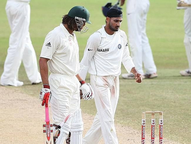 Harbhajan Singh and Andrew Symonds exchanging some words in a Test match.