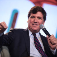 Tucker Carlson shares leaked Dem's topless photo