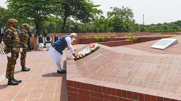  Prime Minister Narendra Modi pays tribute at the National Martyr’s Memorial in Savar, in Dhaka on March 26, 2021. 