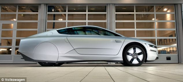 The Volkswagen XL1 'super efficient vehicle' features new construction techniques, an innovative futuristic-looking body and hybrid drive-train to dramatically increase fuel economy