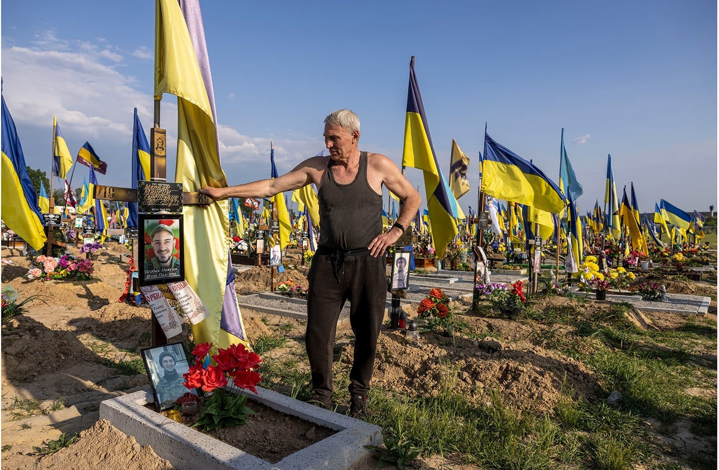 Vitaly Lenets, 61 yrs, a former grave digger who now looks after the graveyards at Kharkiv Cemetery