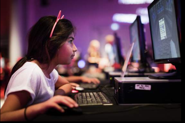 Image of child gaming on a computer during a Power UP session