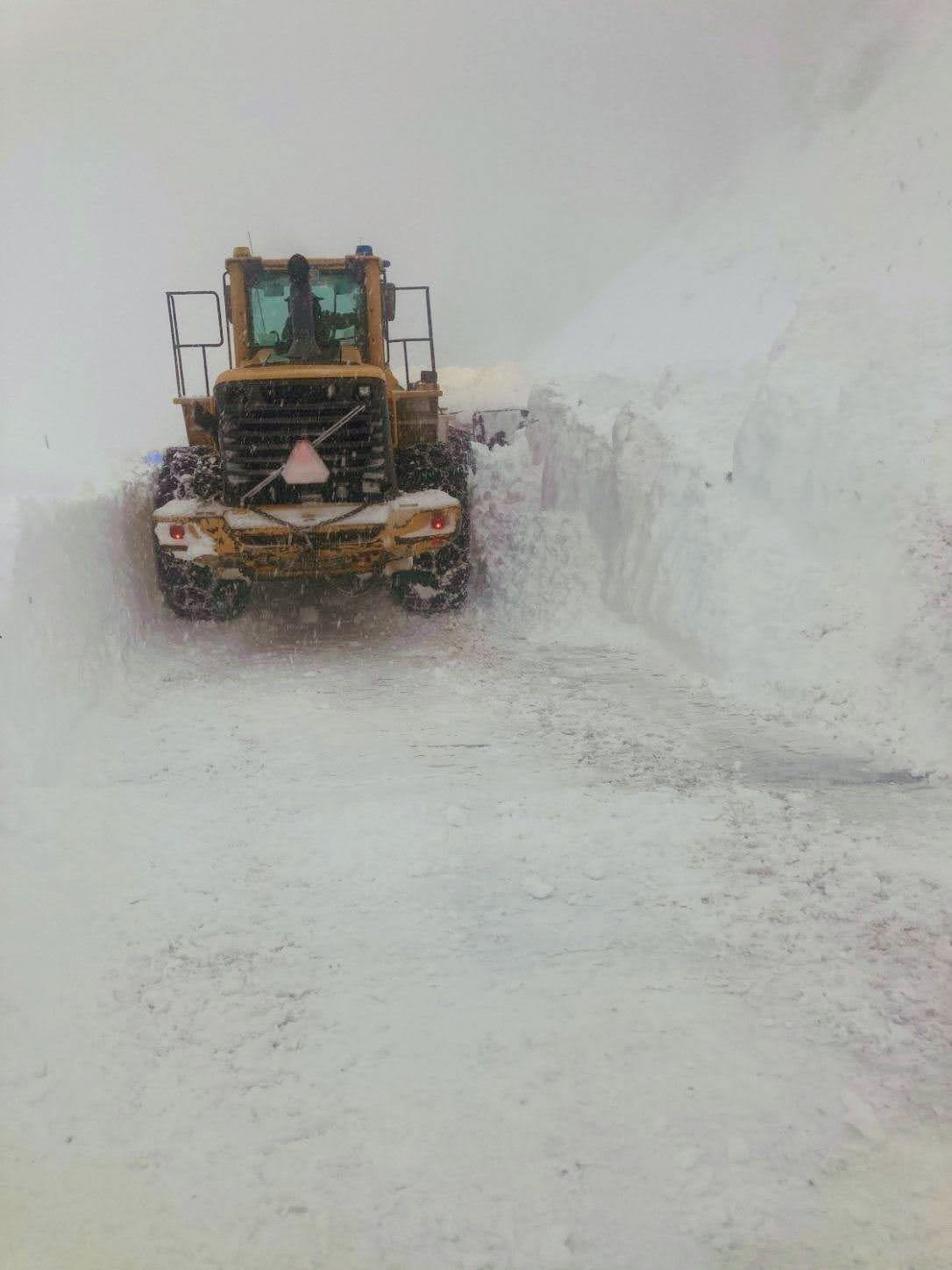 Heavy equipment clears snow slides from US 160 Wolf Creek Pass